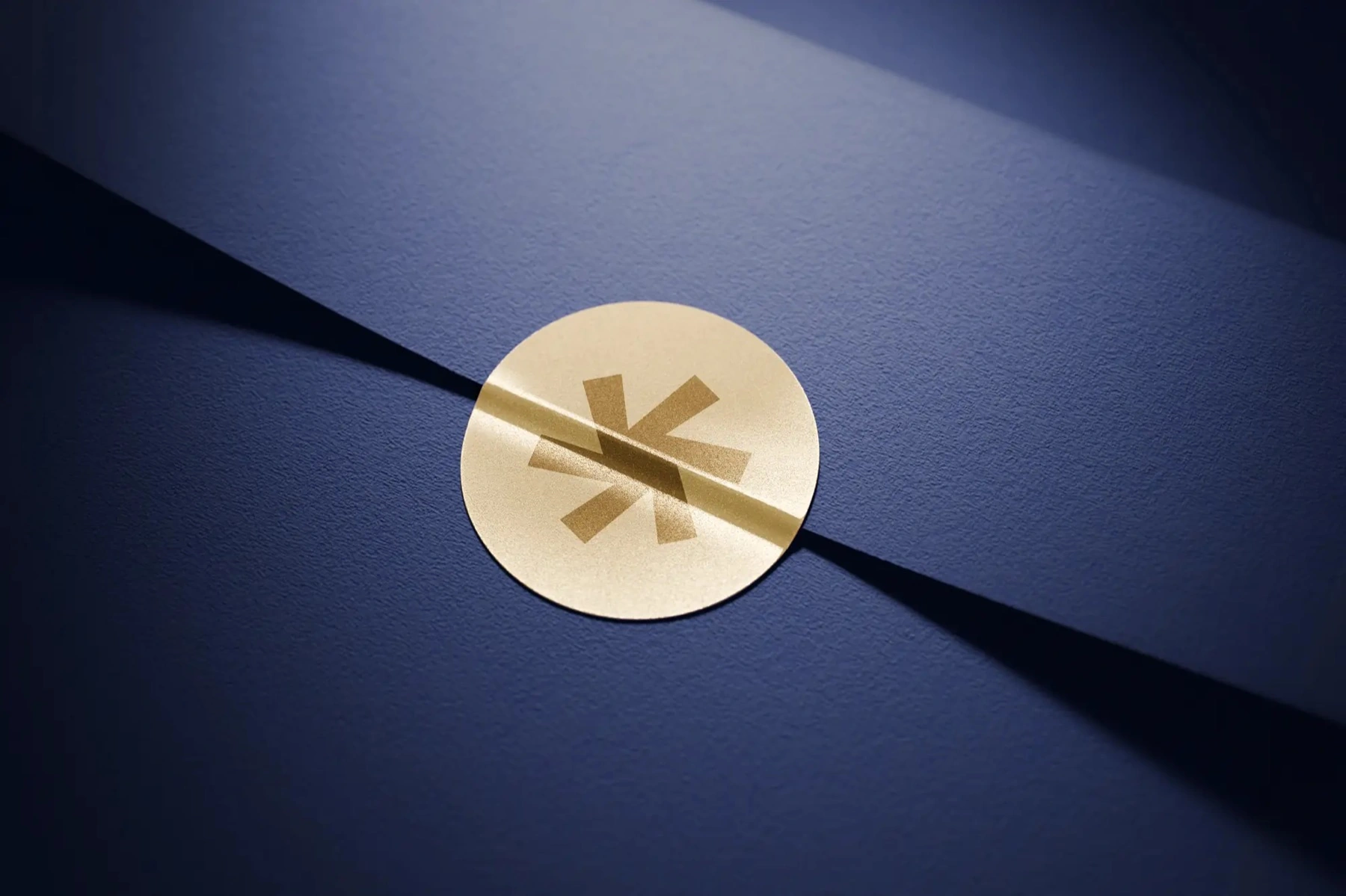 The mark as object — the asterisk struck in gold foil